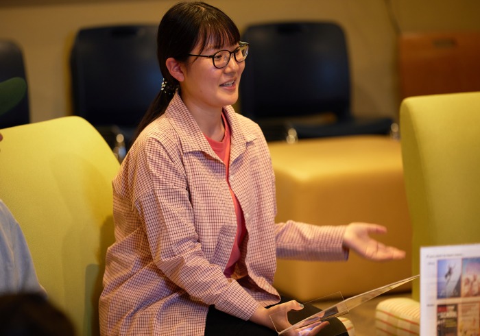 A DEI student staff member participates in a discussion