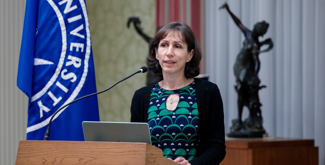 Dr. Ivana Nikolić Hughes speaks into the microphone during the Choose Hope event on SUA's campus.