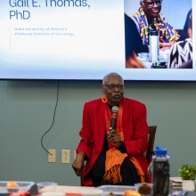 Gail Thomas, professor emerita of sociology, speaks during the community dialogue portion of MLK Week Gail Thomas, professor emerita of sociology, speaks during the community dialogue portion of MLK Week