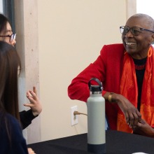 Gail Thomas, professor emerita of sociology, speaks with students