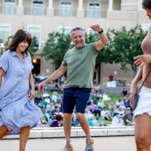 Concert goers enjoy dancing during CaliSamba's performance at SUA