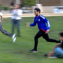 Students are a blur as they run fullspeed during a competition