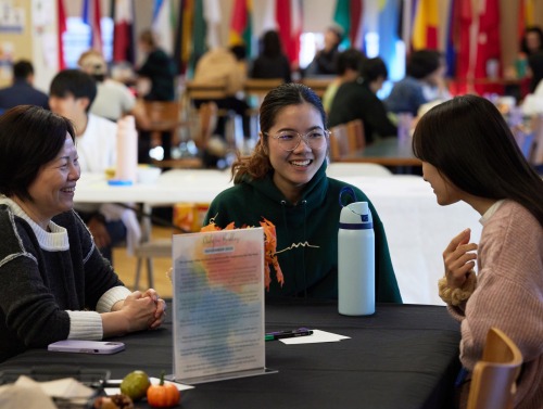 Students engage in conversation during Dialogue Buddies