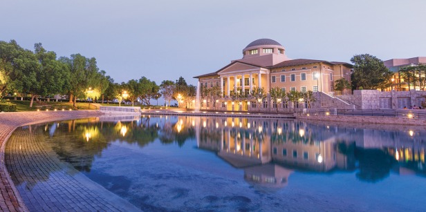 Overlooking Peace Lake at twilight with Founders Hall in the background