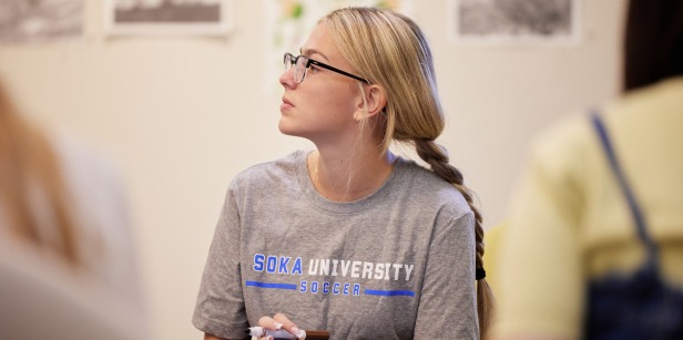 A student listens during a discussion