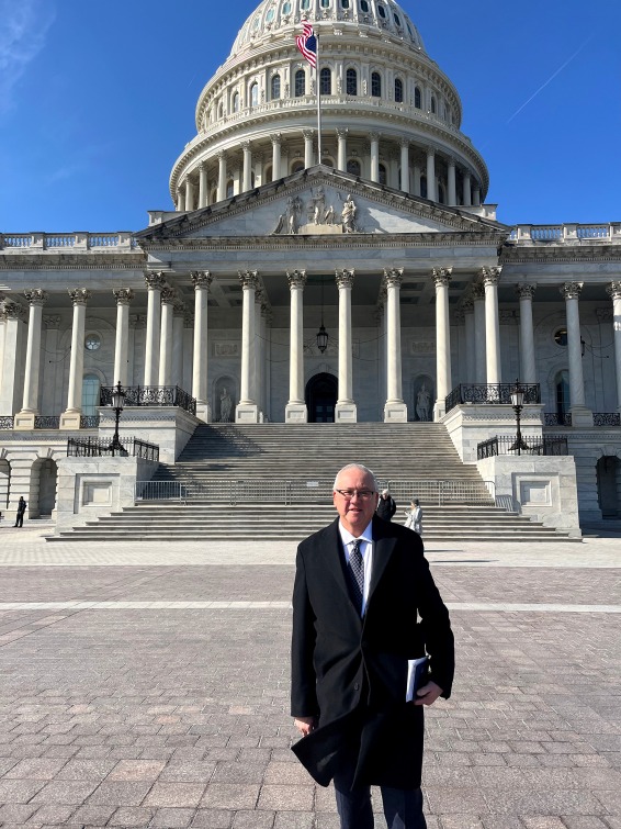 SUA President Ed Feasel stands in front of the U.S. Capitol Building in Washington, D.C.