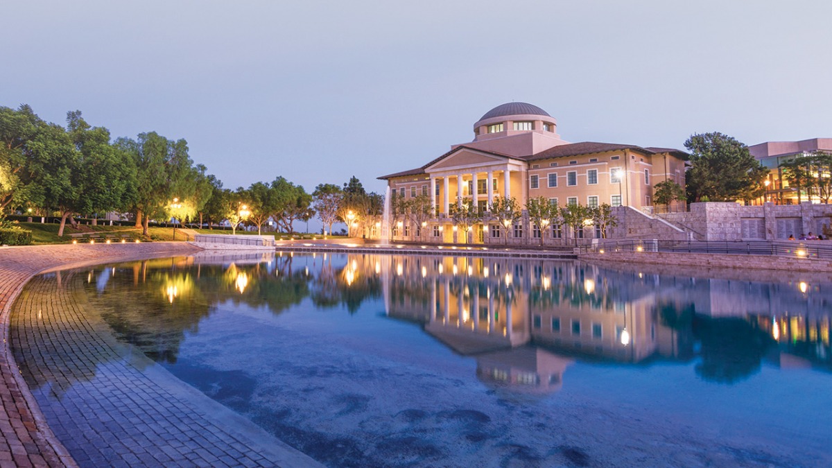 Overlooking Peace Lake at twilight with Founders Hall in the background