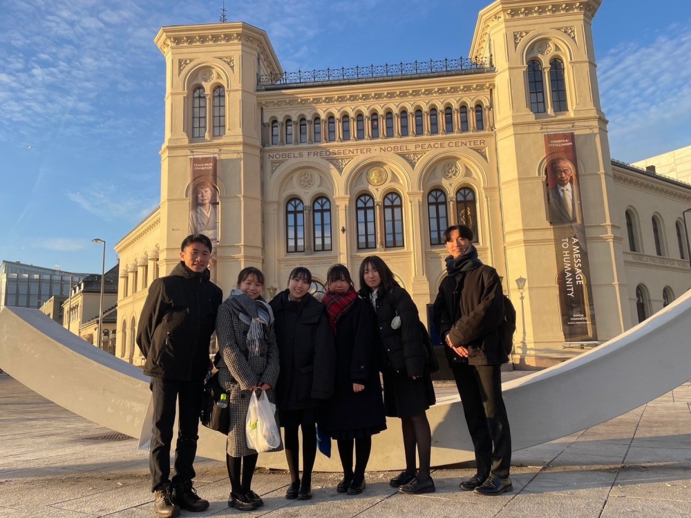 Daiki Katsukawa ’26 poses in Norway with a delegation of high school Peace Messengers