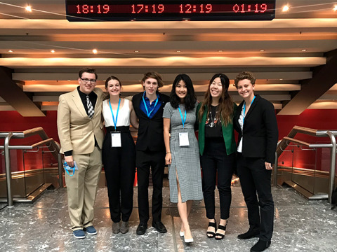 Soka's Model UN team posing at the airport