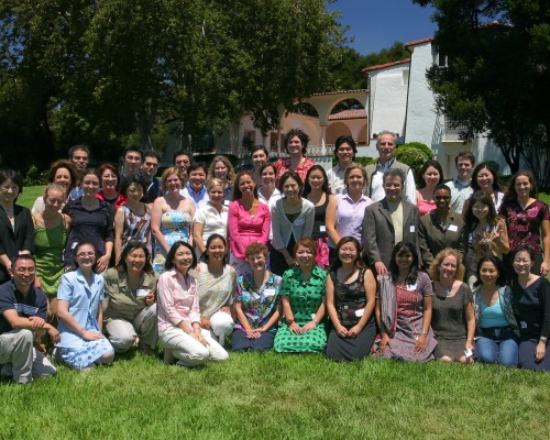 Alumni, students, staff, faculty, and guests pose for a group photo during the Graduate Schools 10th Anniversary celebration