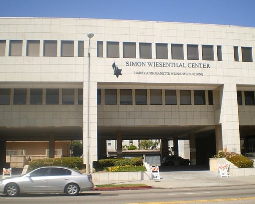 A gray car is parked outside of Simon Wiesenthal Center in Los Angeles